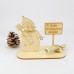 Schneemann mit Ortsschild und Geldscheinhalter
