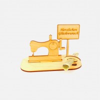 Nähmaschine stehend mit Schild und Geld-Gutscheinhalter